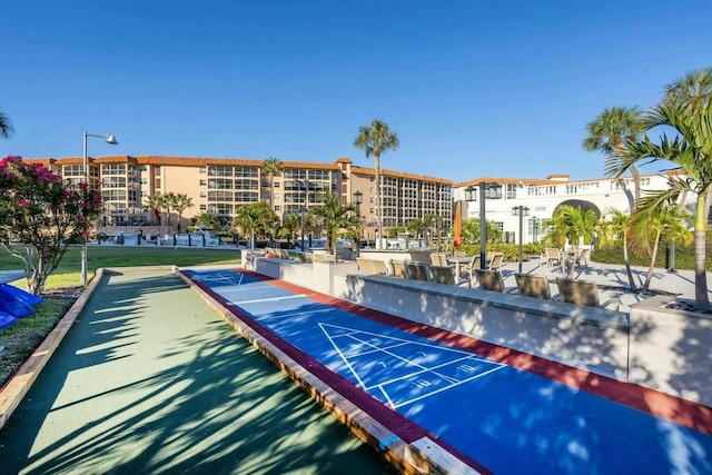 2871 N Ocean Blvd Unit F427, Boca Raton, FL 33431 - view of property's community featuring shuffleboard and uncovered parking