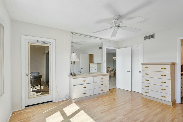 2871 N Ocean Blvd Unit F427, Boca Raton, FL 33431 - bedroom featuring light wood-style flooring, a ceiling fan, and a closet