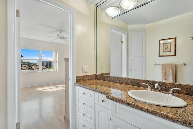 2871 N Ocean Blvd Unit F427, Boca Raton, FL 33431 - bathroom with a ceiling fan, wood finished floors, and vanity