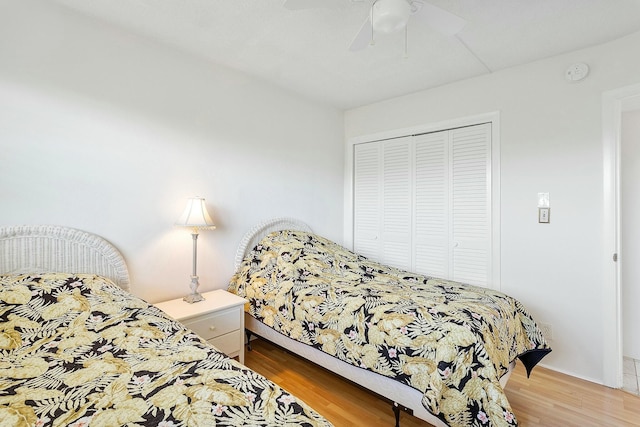 2871 N Ocean Blvd Unit F427, Boca Raton, FL 33431 - bedroom featuring a closet, wood finished floors, and a ceiling fan