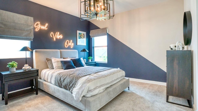 bedroom with light colored carpet