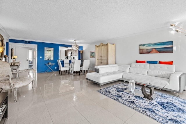 tiled living room featuring crown molding and a textured ceiling