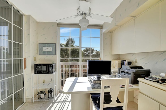 tiled office space with ceiling fan