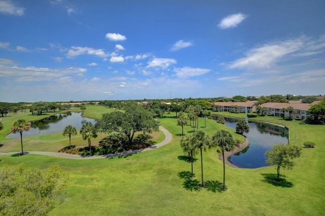 surrounding community featuring a water view