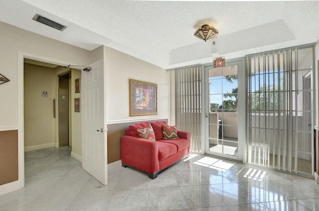 interior space with a textured ceiling