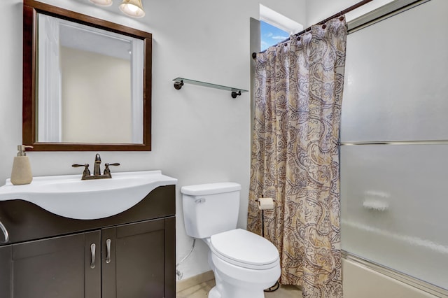 full bathroom featuring shower / bathtub combination with curtain, vanity, and toilet