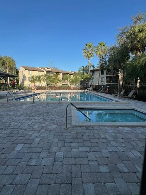 view of swimming pool featuring a patio