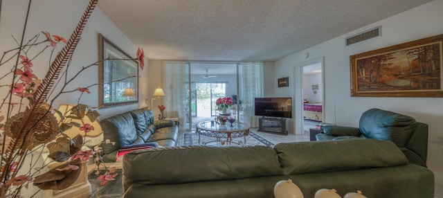 living room with a textured ceiling