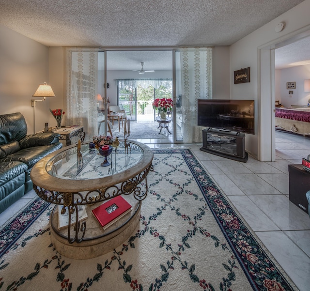 tiled living room featuring a textured ceiling