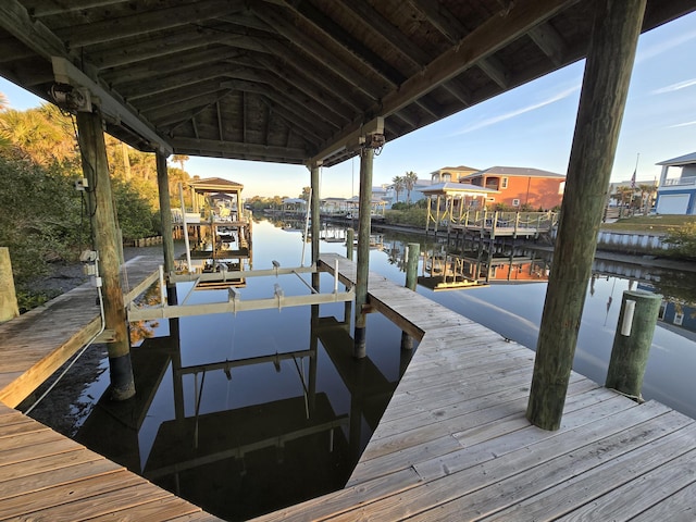 view of dock with a water view