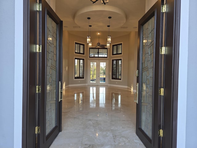 foyer entrance featuring french doors