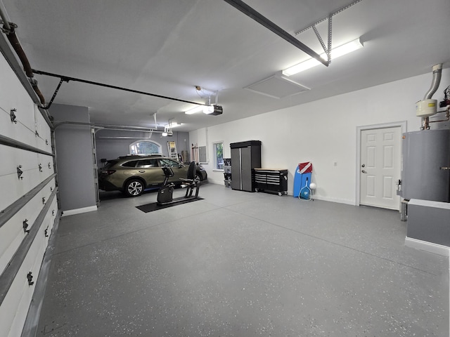 garage with water heater, a garage door opener, and electric panel