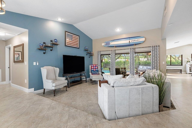 living area with visible vents, baseboards, and vaulted ceiling