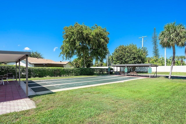 view of community featuring a lawn