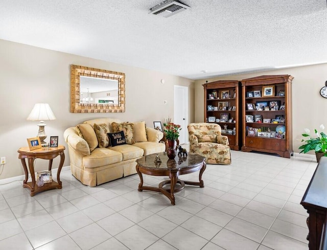 living room featuring a textured ceiling