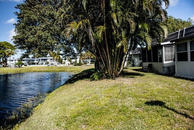 view of yard with a water view