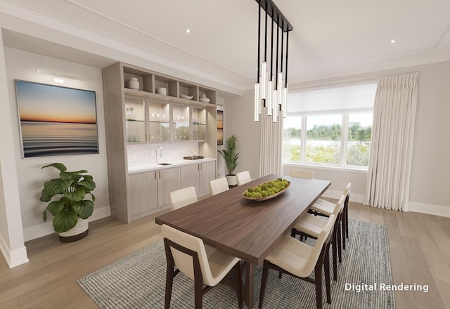 dining space featuring light hardwood / wood-style flooring and ornamental molding