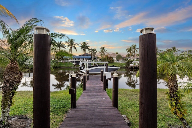 dock area featuring a water view