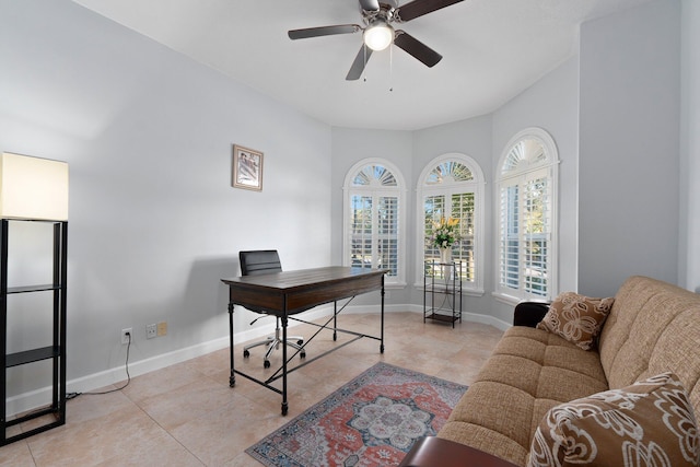 tiled office space with ceiling fan