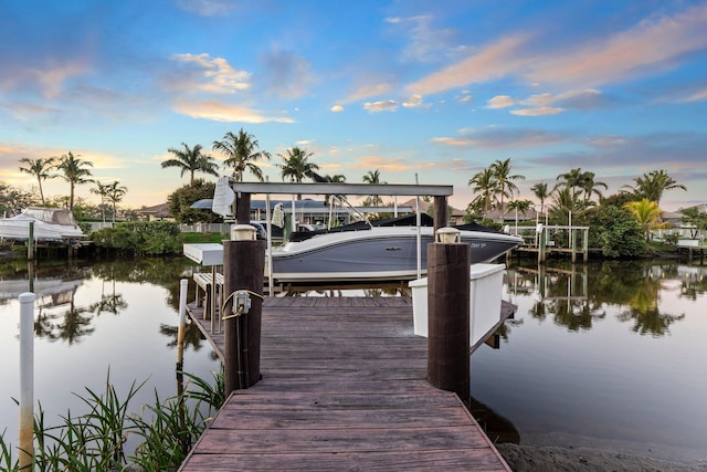 dock area featuring a water view