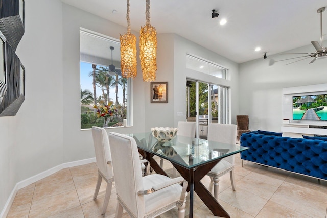 dining space with ceiling fan and light tile patterned floors