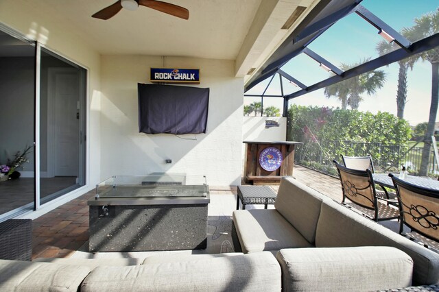 24031 SW Firenze Way, Port Saint Lucie, FL 34986 - view of patio with outdoor dining area, glass enclosure, and ceiling fan