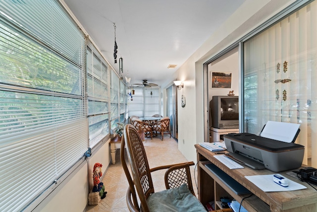 office area with ceiling fan