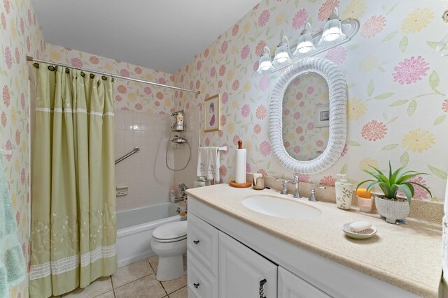 full bathroom featuring vanity, toilet, tile patterned flooring, and shower / bath combo