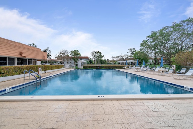 view of pool with a patio area