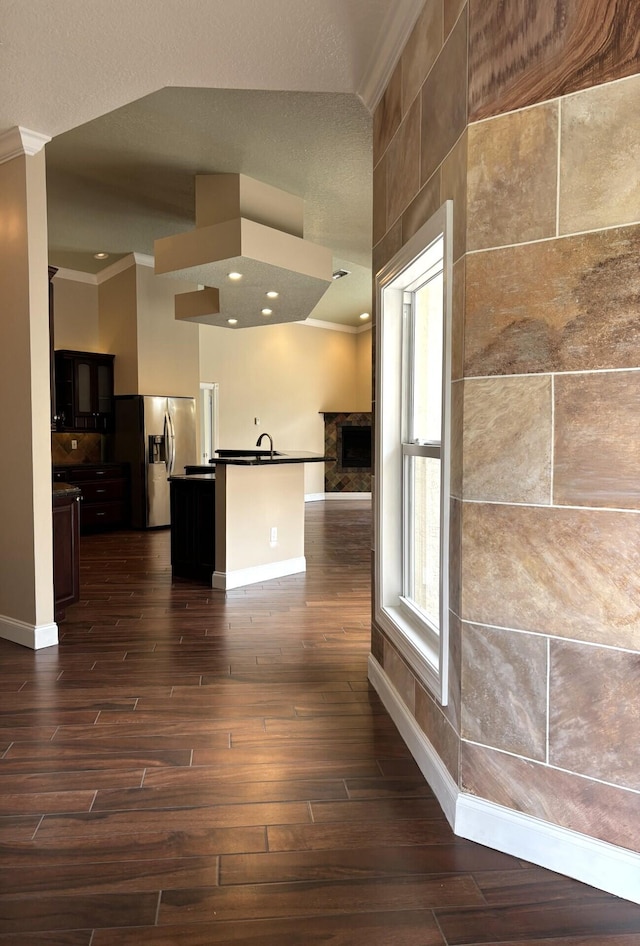 14717 11th Ter, Loxahatchee Groves, FL 33470 - kitchen with stainless steel fridge with ice dispenser, crown molding, baseboards, dark wood-type flooring, and recessed lighting