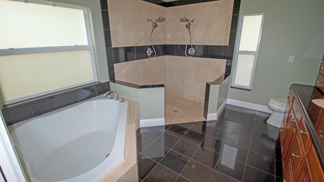 full bathroom with tile patterned floors, toilet, vanity, and separate shower and tub