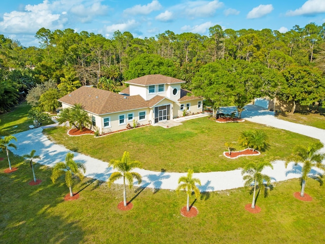 14717 11th Ter, Loxahatchee Groves, FL 33470 - view of subject property featuring a forest
