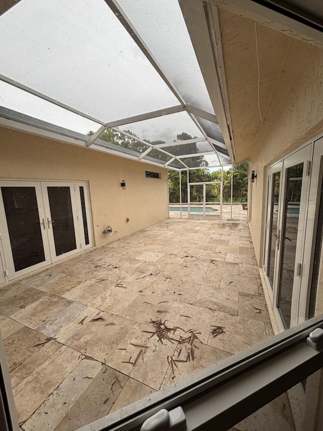 14717 11th Ter, Loxahatchee Groves, FL 33470 - view of patio / terrace with french doors, an outdoor pool, and glass enclosure