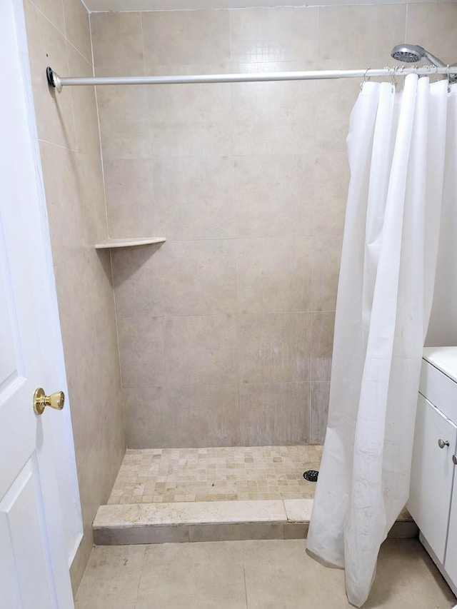 bathroom with a shower with curtain