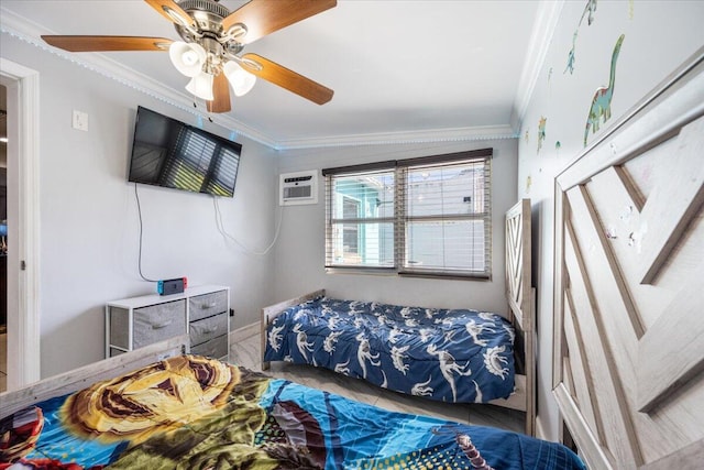 bedroom with crown molding, ceiling fan, and a wall unit AC