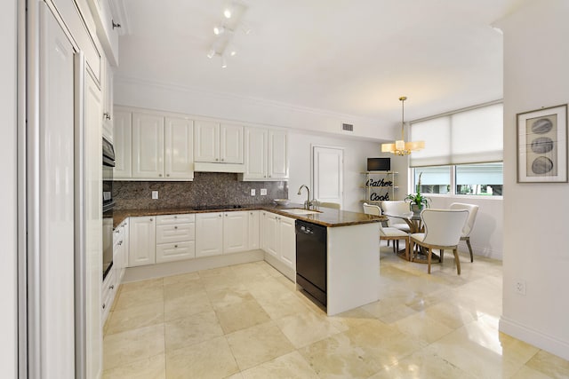 kitchen with white cabinetry, tasteful backsplash, kitchen peninsula, pendant lighting, and black appliances