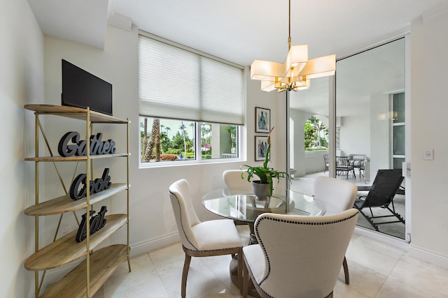 dining area featuring plenty of natural light, light tile patterned floors, and a notable chandelier