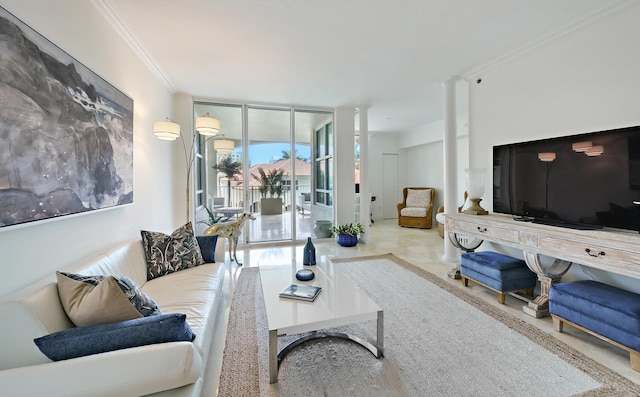 living room with ornamental molding and a wall of windows