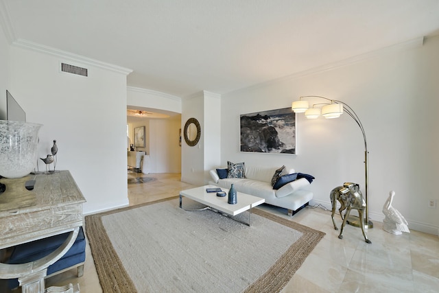 living room with ornamental molding