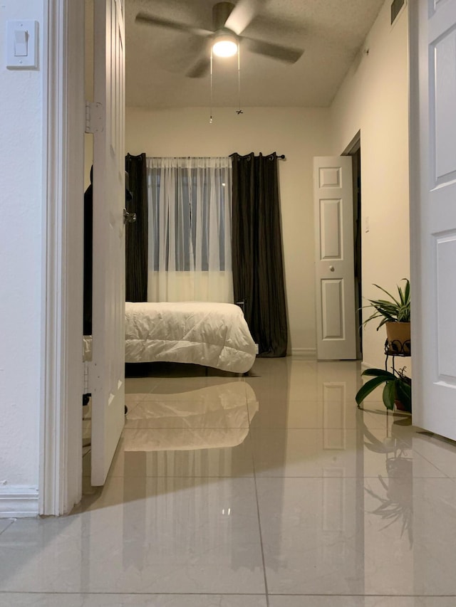 bedroom featuring ceiling fan