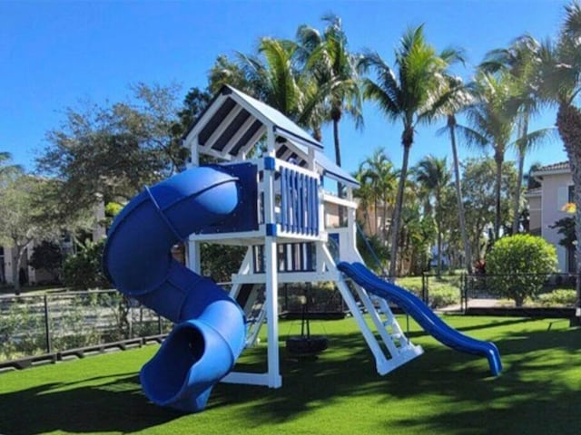 view of jungle gym with a yard