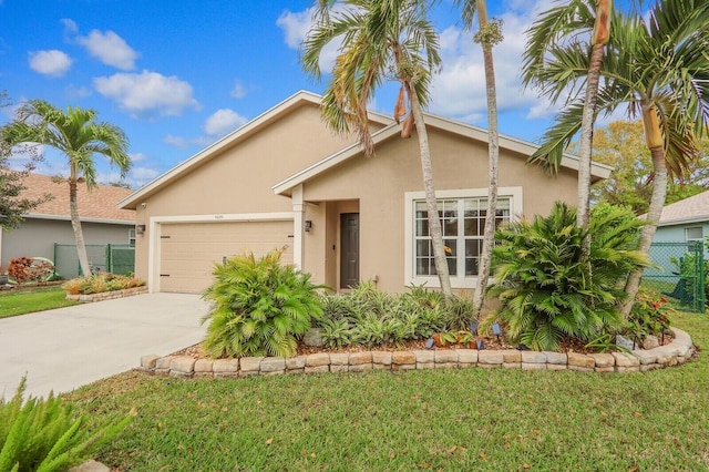 ranch-style house with a garage and a front lawn