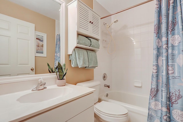 full bathroom featuring vanity, shower / tub combo, and toilet