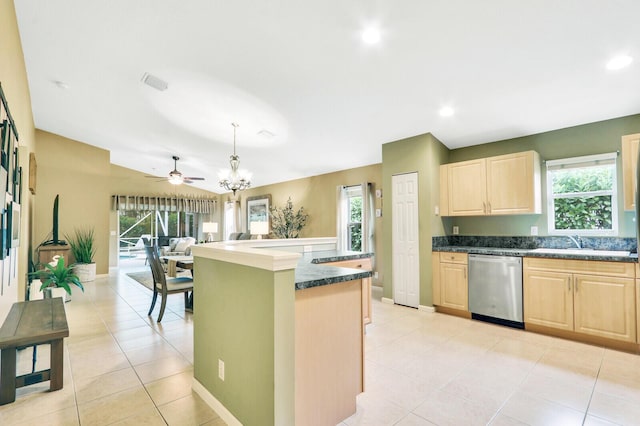 kitchen featuring pendant lighting, sink, a kitchen island with sink, stainless steel dishwasher, and light brown cabinets