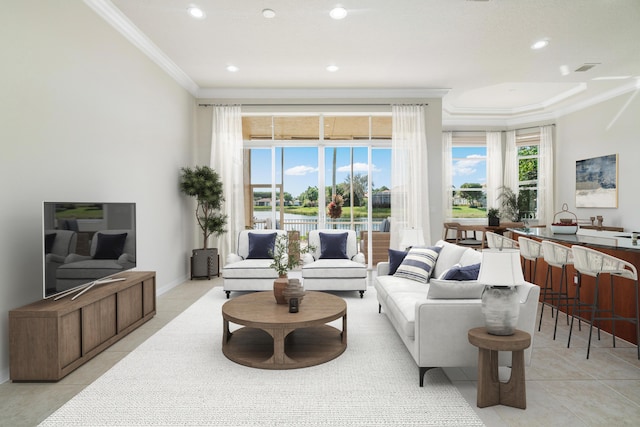 living room featuring crown molding and light tile patterned flooring