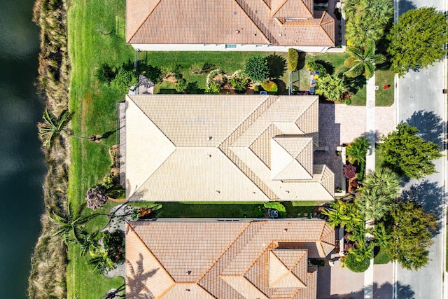 bird's eye view with a water view