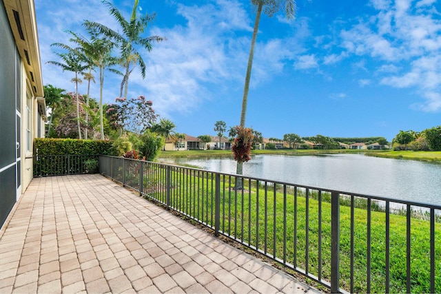 view of patio / terrace with a water view