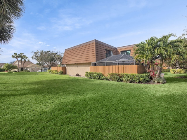 view of yard featuring a lanai