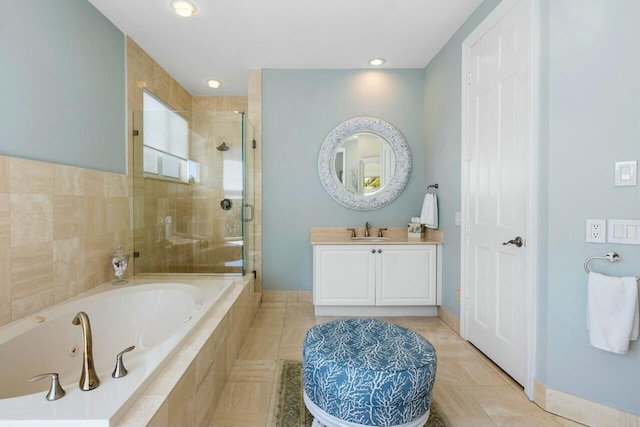 bathroom featuring vanity, separate shower and tub, and tile patterned flooring