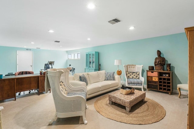 living room with light colored carpet